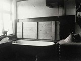 Bath tub with table top over in scullery pre 1920